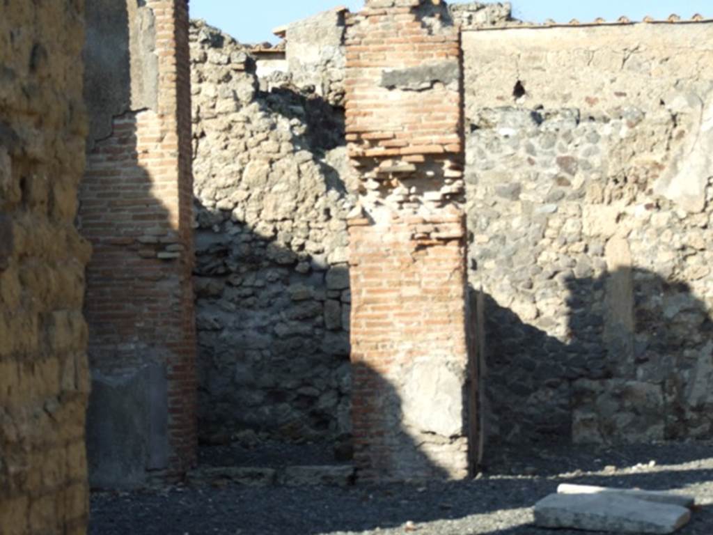 VI.14.5 Pompeii. December 2007. Doorways to cubiculum and tablinum, on north side of atrium.