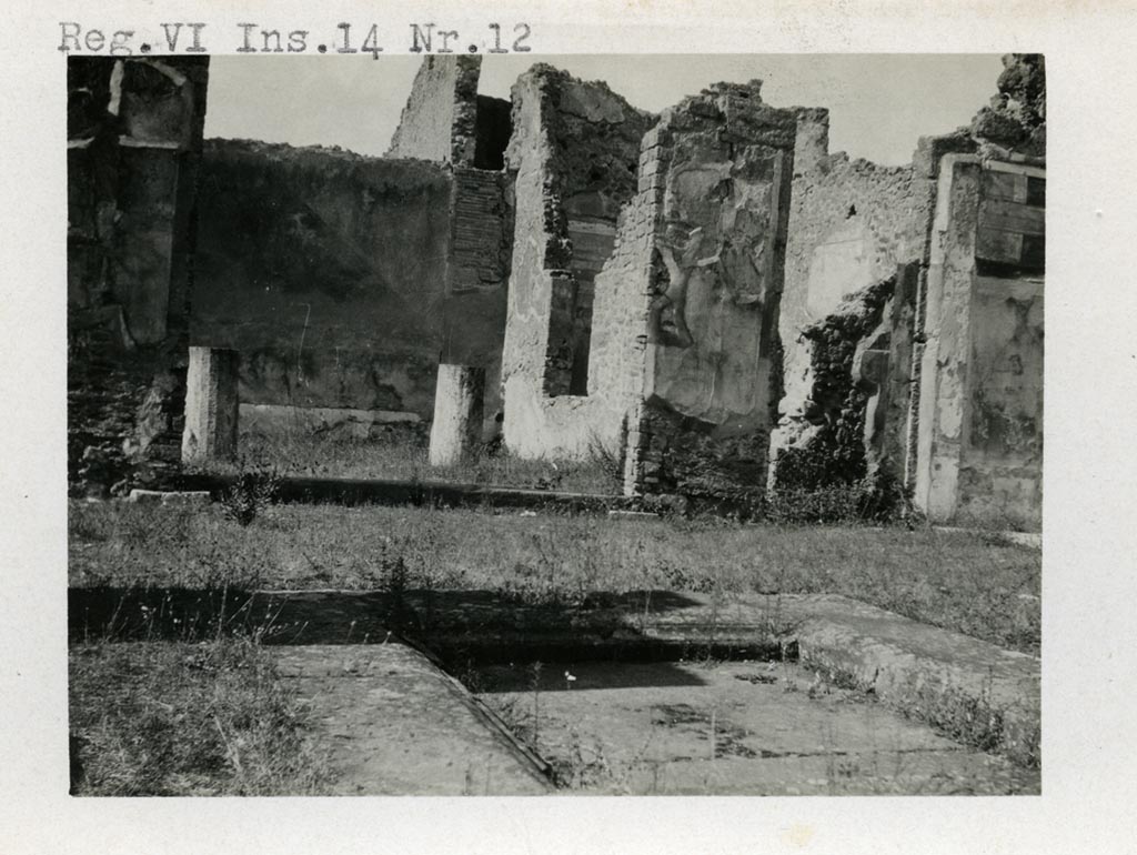 VI.14.12 Pompeii. Pre-1937-39. 
Looking north-east in atrium, with garden on left, doorway to triclinium, and painted north wall of east ala, on right.
Photo courtesy of American Academy in Rome, Photographic Archive. Warsher collection no. 1835.

