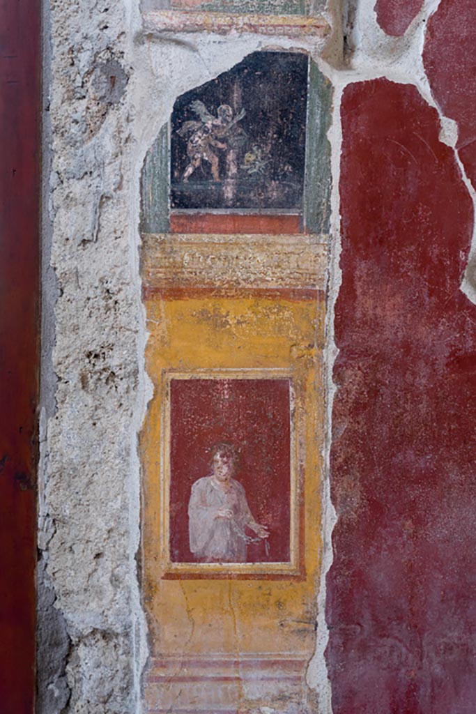 VI.15.1 Pompeii. March 2023. 
Painted panel on west wall between atrium and north ala. Photo courtesy of Johannes Eber.
