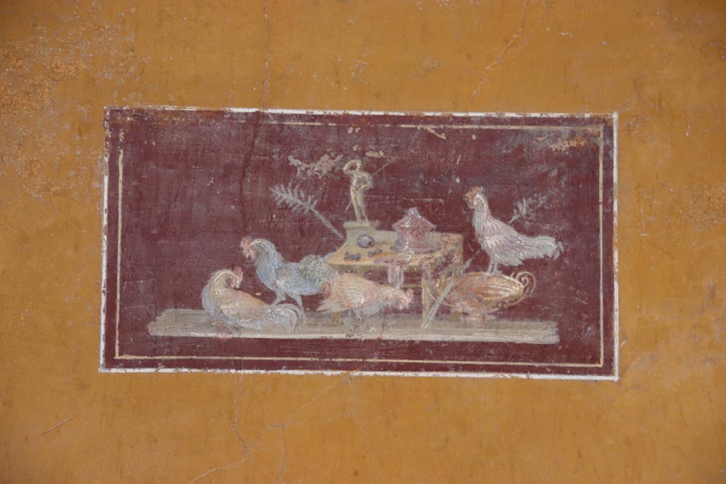 VI.15.1 Pompeii. October 2023. Detail of painted panel in middle of north wall of ala i. Photo courtesy of Klaus Heese.