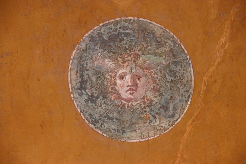 VI.15.1 Pompeii. October 2023. Medallion on north wall, with painted head of Medusa. Photo courtesy of Klaus Heese.