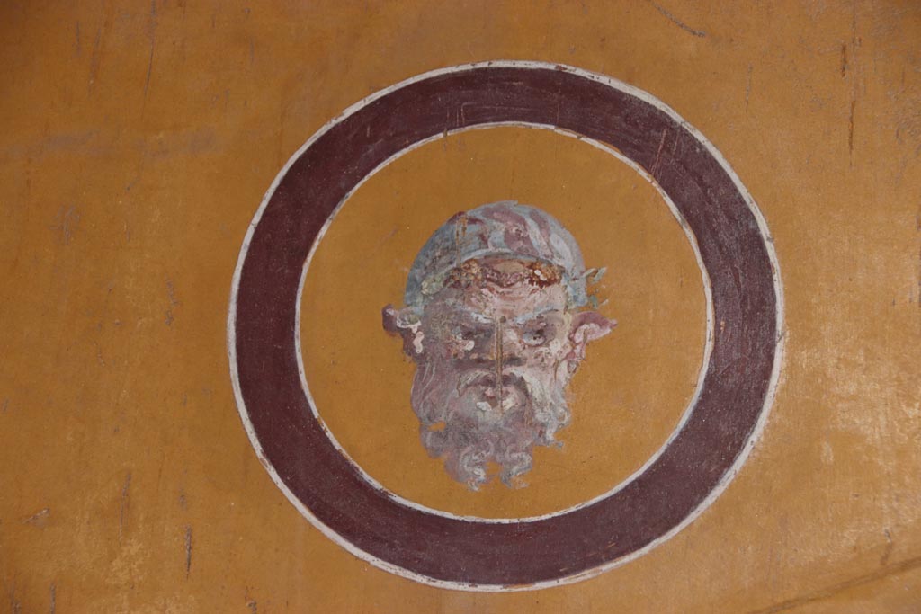 VI.15.1 Pompeii. October 2023. Painted medallion from north end of east wall. Photo courtesy of Klaus Heese.