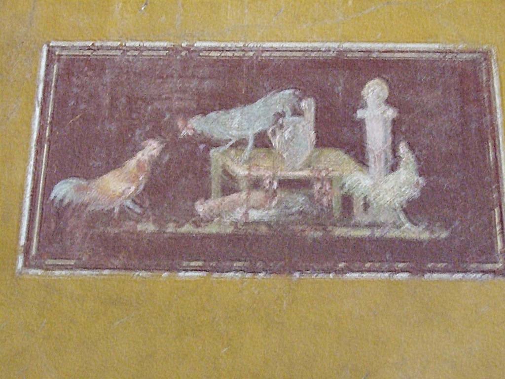 VI.15.1 Pompeii. December 2006. Detail of painting with cocks in ala on south side of atrium.