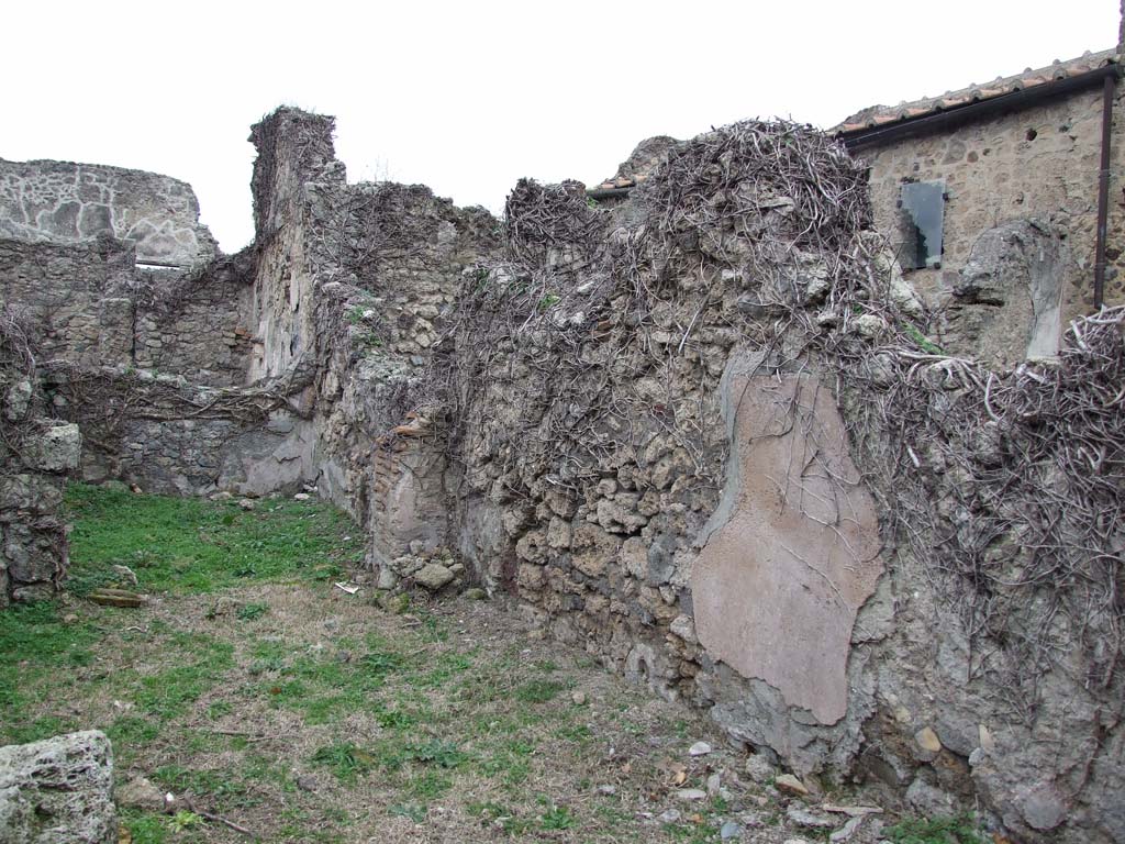 VI.16.12 Pompeii. December 2007. North wall of shop and rear room.