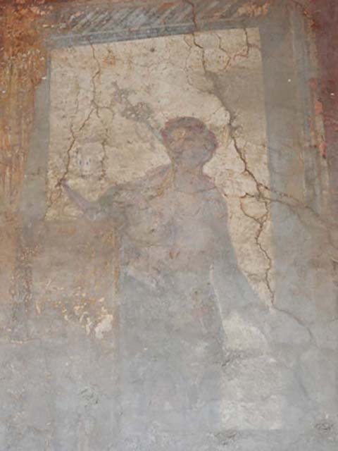 VI.16.15 Pompeii. December 2006. South end of upper west wall of atrium B above room D. 
Detail of wall painting of statue of Poseidon holding trident and fish.