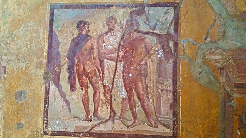 VI.16.15 Pompeii. May 2015. East wall of room G with central wall painting from a myth of Hercules. Photo courtesy of Buzz Ferebee.
