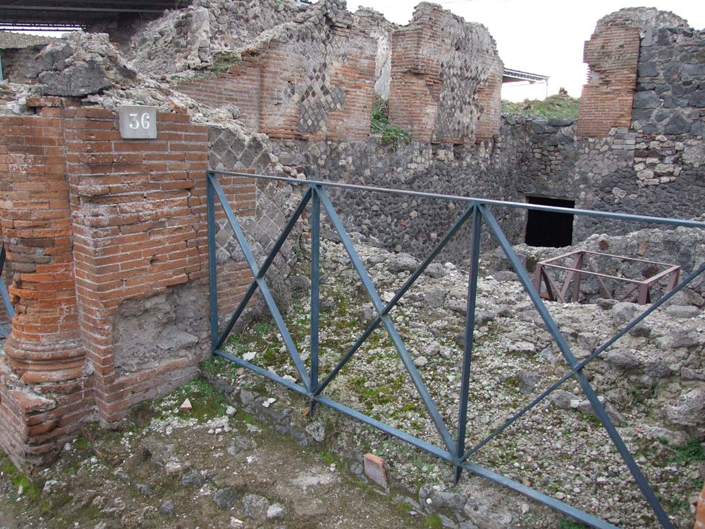 VI.17.36 Pompeii. December 2007. Entrance doorway with remains of steps, looking south-west at the different levels.
