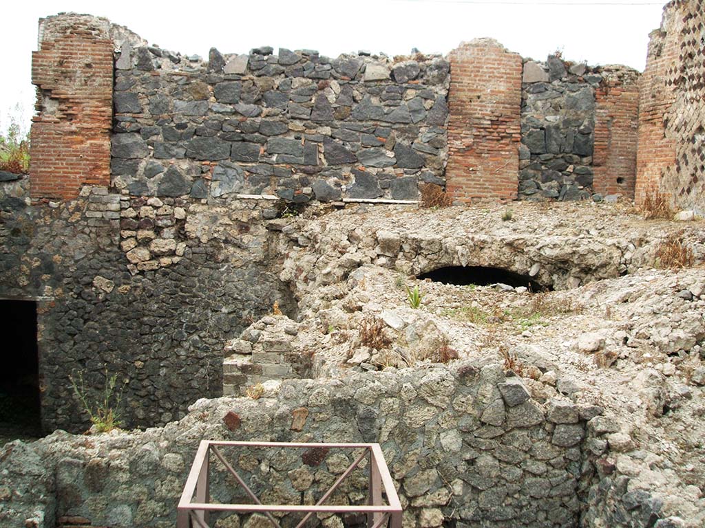VI.17.36 Pompeii, May 2005. Looking west across lower rooms. Ahead would have been the wide doorway to the atrium, now blocked.  
