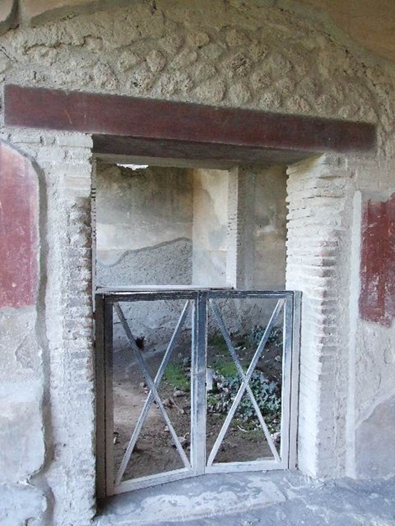 VII.1.8 Pompeii. May 2012. Room Q, the office of the baths superintendent.
Window into room Q, from north portico B.  Photo courtesy of Buzz Ferebee.

