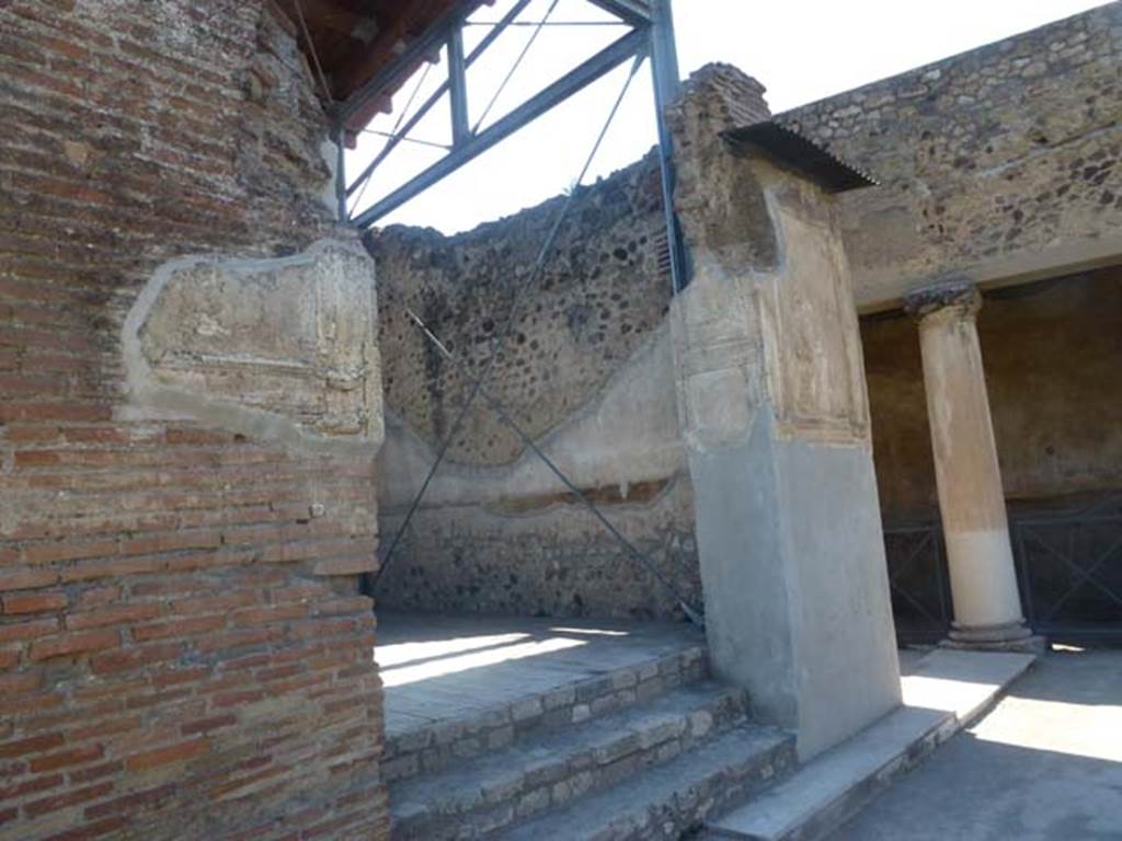 VII.1.8 Pompeii. June 2012. Entrance to nymphaeum G in north-west corner of gymnasium C. Room R and corridor H leading to the entrance at VII.1.51 can be seen behind. Photo courtesy of Michael Binns.
