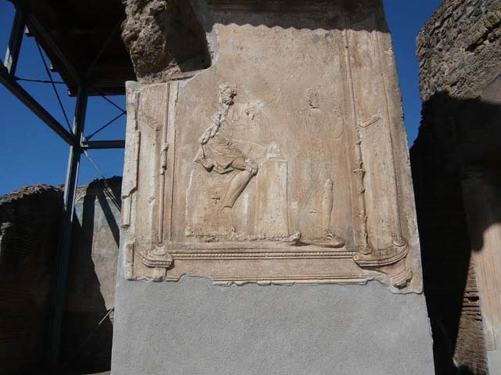 VII.1.8 Pompeii. May 2012. Pilaster on north side of nymphaeum G entrance. 
According to Mau, on the outer wall was a stucco relief of Daedalus making wings for himself and Icarus. See Mau, A., 1907, translated by Kelsey F. W. Pompeii: Its Life and Art. New York: Macmillan, p. 200. Photo courtesy of Buzz Ferebee.
