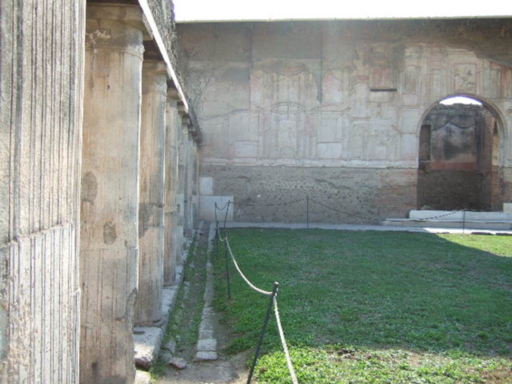 VII.1.8 Pompeii. September 2005. South-west corner of gymnasium C with south side of portico B. 