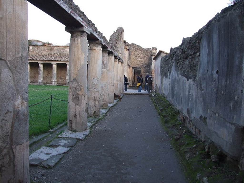 VII.1.8 Pompeii . December 2006. Looking east along south portico B to entrance vestibule A.