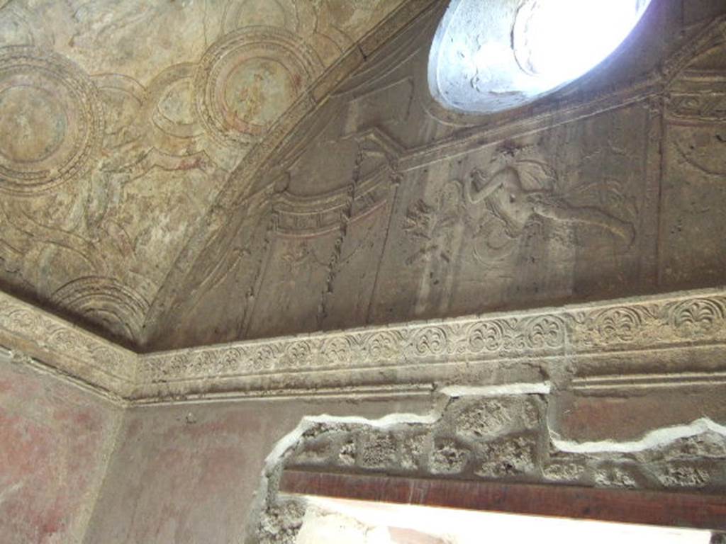 VII.1.8 Pompeii. September 2005. Stucco plaster relief on west end wall in vestibule 1.