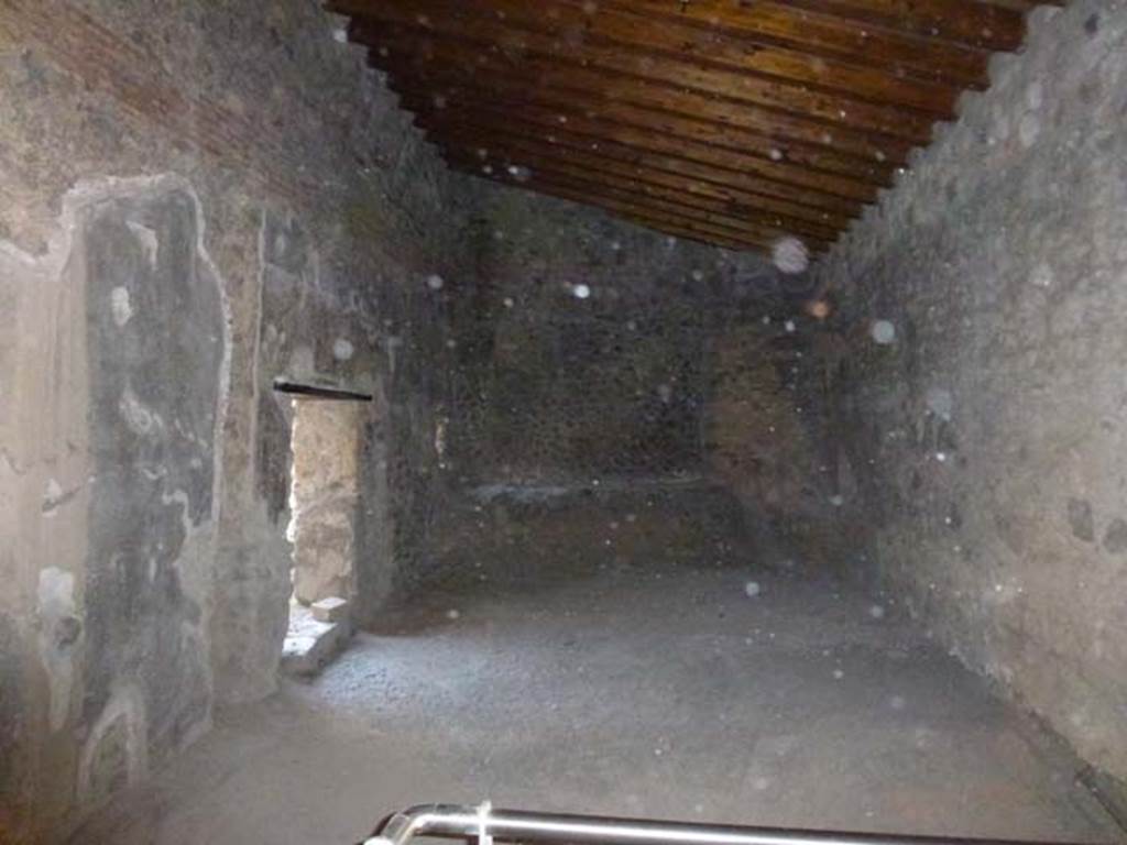 VII.1.8 Pompeii. June 2012. Room 8, anteroom of women’s baths, looking south. The doorway to praefurnium 7 is on the left. Photo courtesy of Michael Binns.
