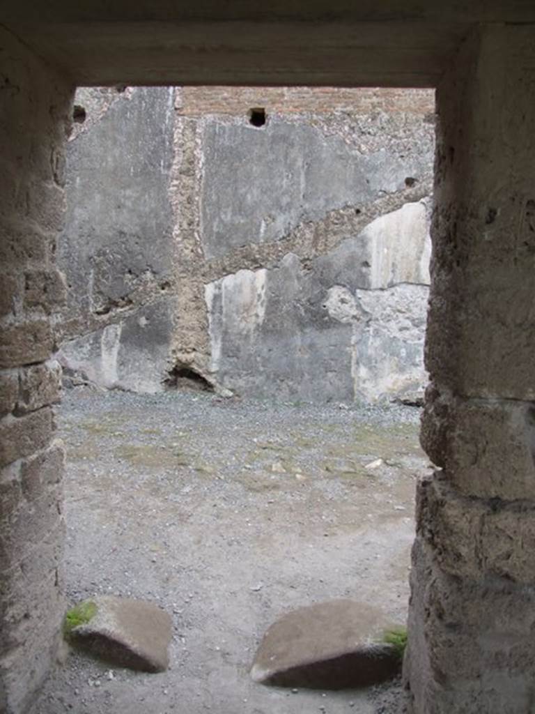 VII.1.8 Pompeii. December 2007. Room 8, women’s baths anteroom. Doorway from gymnasium C, leading to women’s baths and praefurnium 7.
