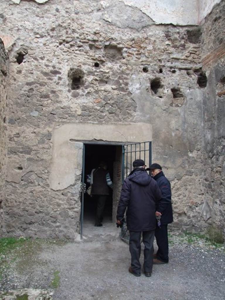 VII.1.8 Pompeii. December 2007. Room 8, women’s baths anteroom, north wall. Doorway to women’s apodyterium 11.