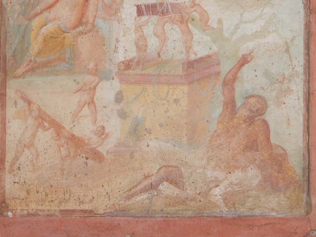 VII.1.47 Pompeii. May 2017. Exedra 10, detail from central painting on north wall.
Four Cupids are on the ground playing with the club of Hercules. 
Photo courtesy of Buzz Ferebee. 
