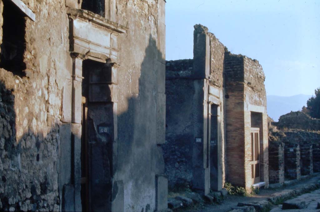 VII.1.48, Pompeii, on left. 4th December 1971. Looking south on Vicolo del Lupanare. 
Photo courtesy of Rick Bauer, from Dr.George Fay’s slides collection.
