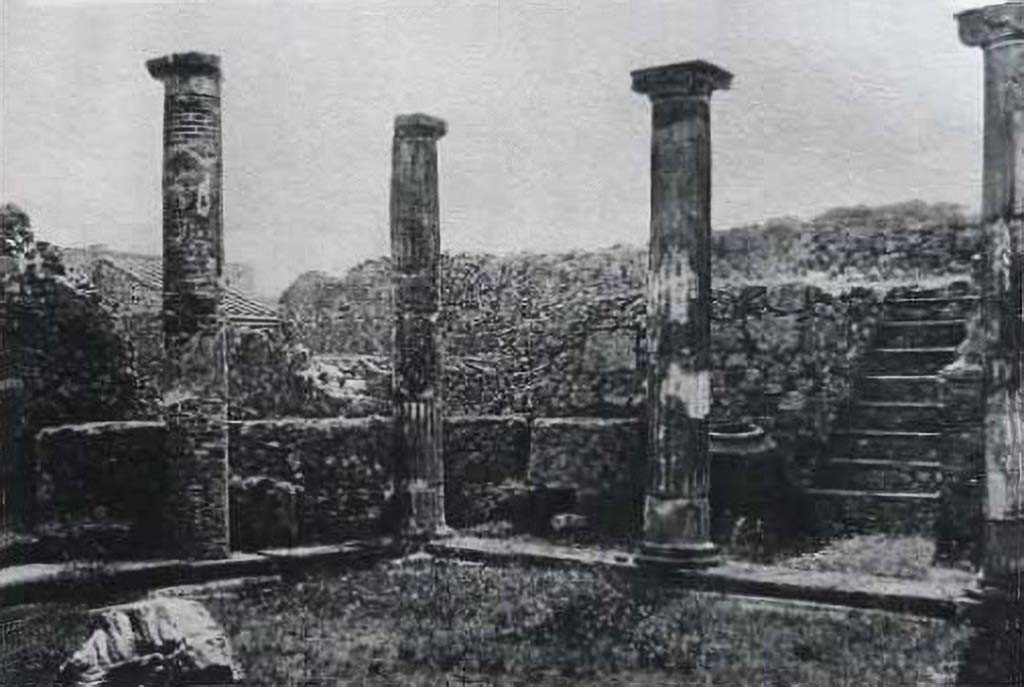VII.2.11 Pompeii. Old undated photograph. Looking towards south-east corner of peristyle, and stairs. 