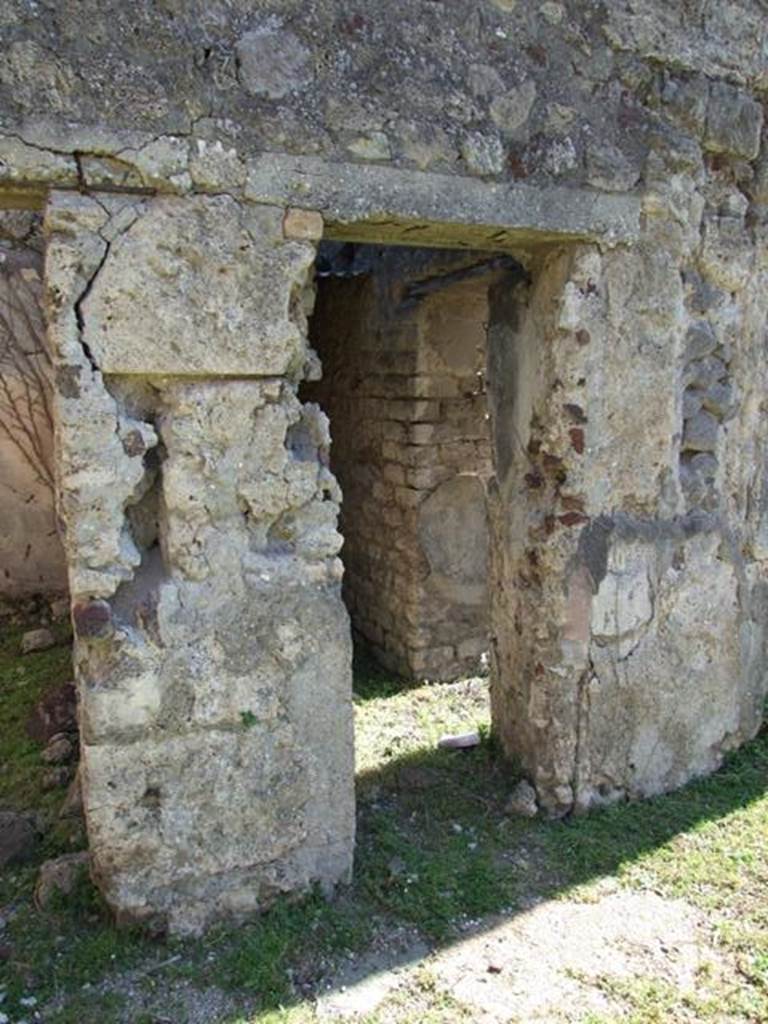 VII.2.16 Pompeii. March 2009. Doorway to room 6 on east portico, with other door linking to room 7.