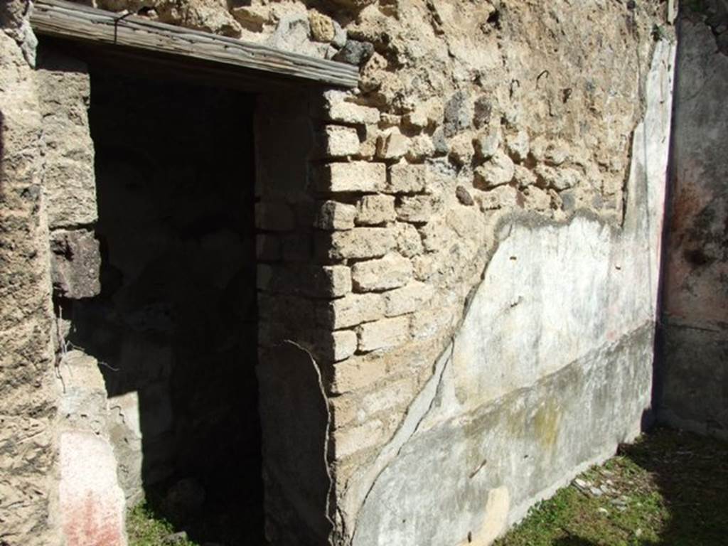 VII.2.16 Pompeii. March 2009. Room 7, north wall of cubiculum, with doorway to room 6.