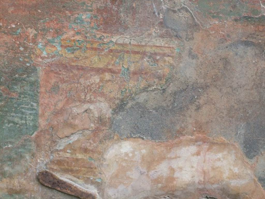 VII.2.20 Pompeii. December 2007. Tablinum 13, detail of remains of wall painting below painting of figure in north-west corner.