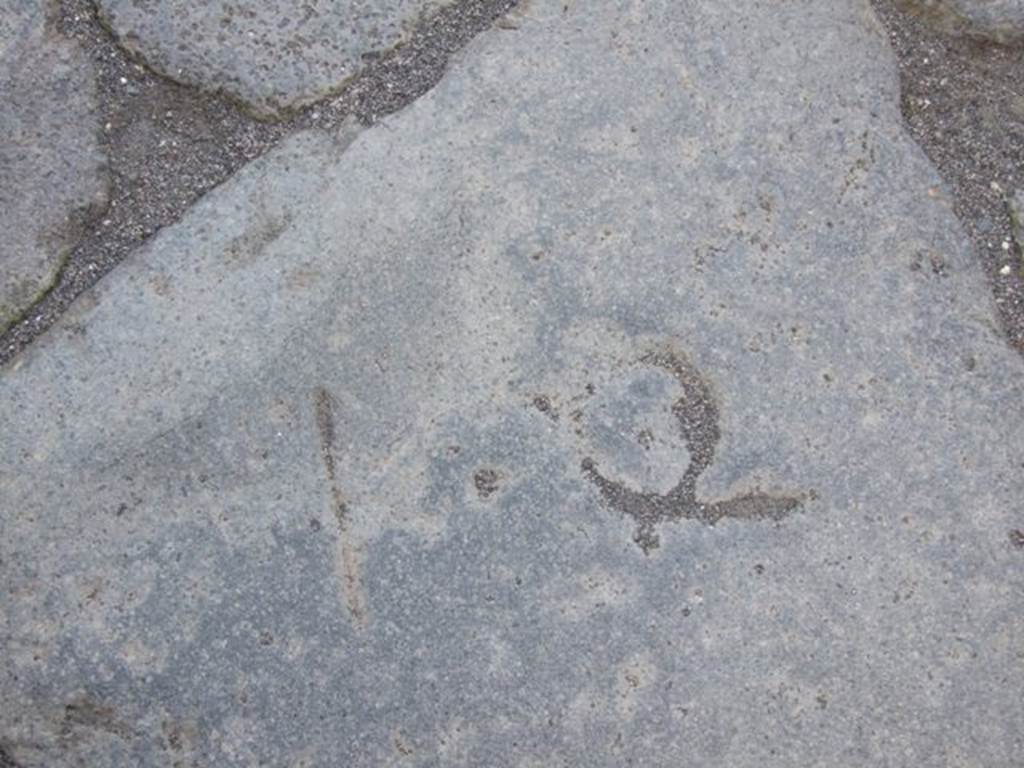 December 2007. Inscription K.Q. in Vicolo Storto outside VII.2.28. 
K.Q is Kalendis Quintilibus (July 1st).  According to Mau this apparently relates to the laying of pavement and must go back before 44BC when the month QUINCTILUS was changed to IULIUS, our July. Pompeii was therefore paved before 44BC.
See Mau, A., 1907, translated by Kelsey F. W. Pompeii: Its Life and Art. New York: Macmillan. (p.228).

