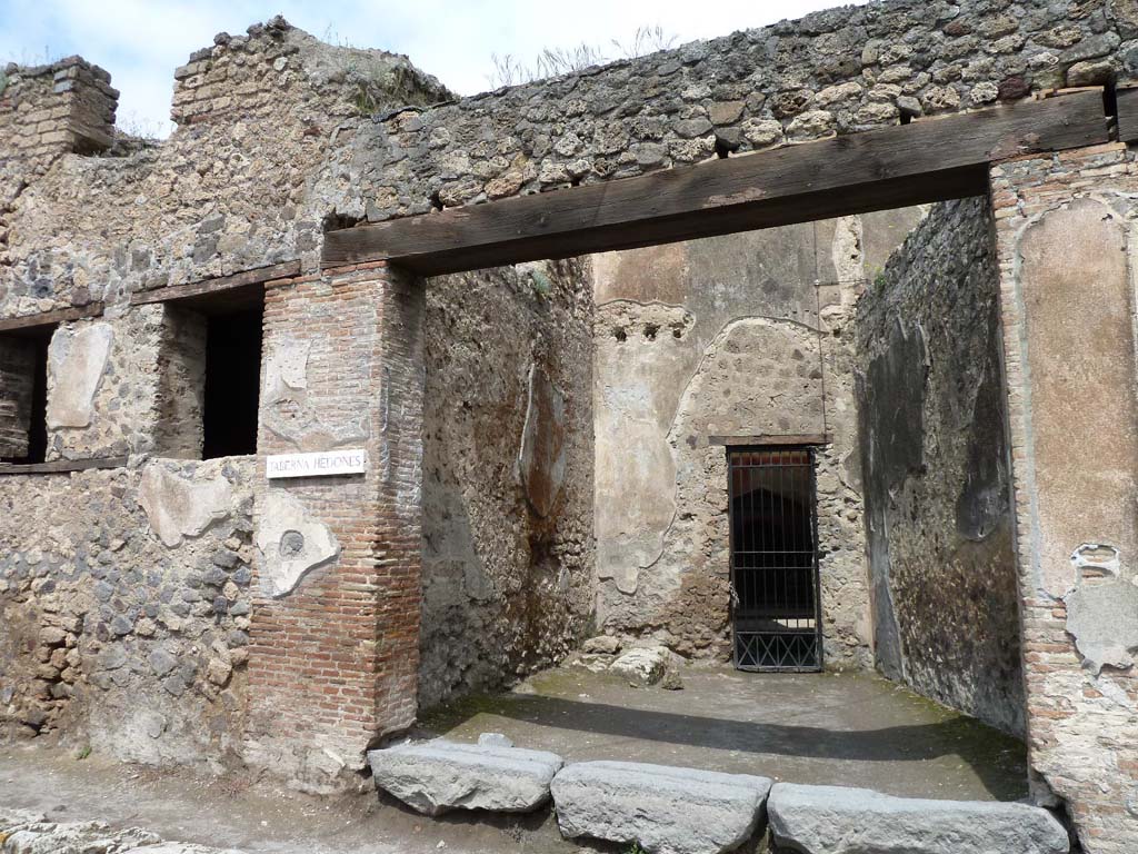 VII.2.45 Pompeii. May 2010. The two windows are in VII.2.45. 
They are in the room on the south side of the first room on the west side of the atrium. 
To the right is VII.2.44 with a rear doorway into the atrium of VII.2.45.

