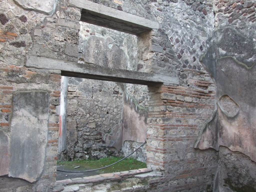 VII.4.48 Pompeii. December 2007. Room 12.  South wall with window to peristyle garden room.