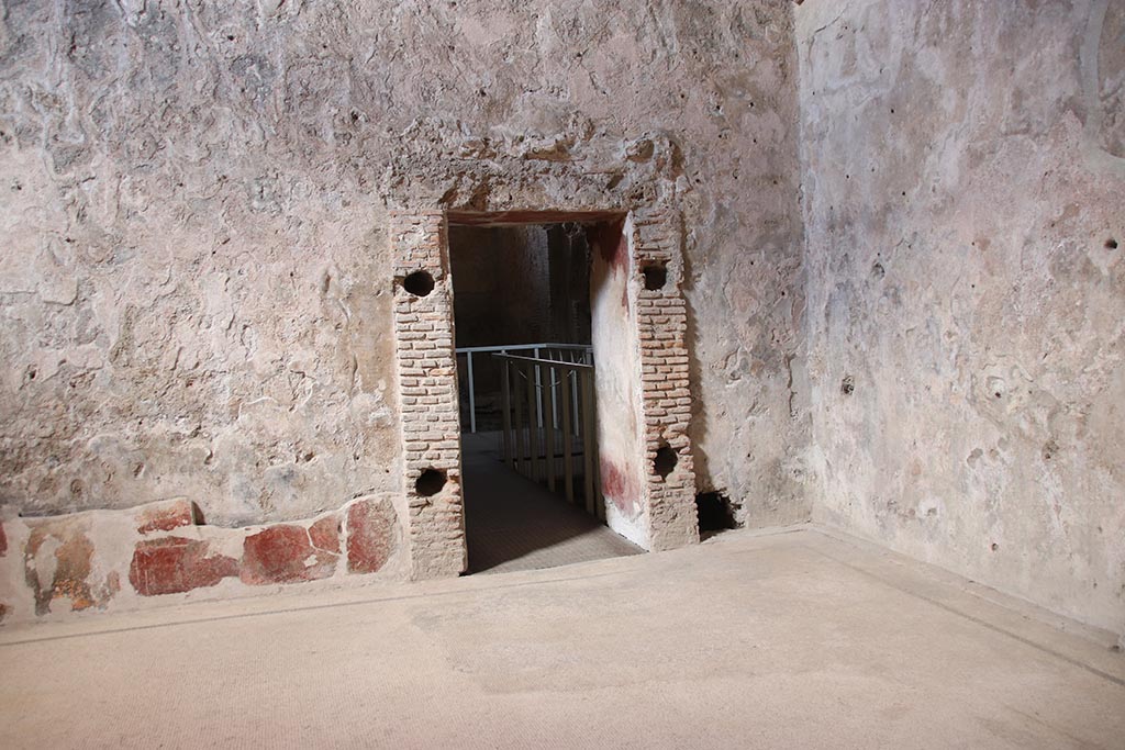 VII.5.8 Pompeii. October 2024. Tepidarium (49), doorway into Caldarium (50) at east end of north wall. Photo courtesy of Klaus Heese.