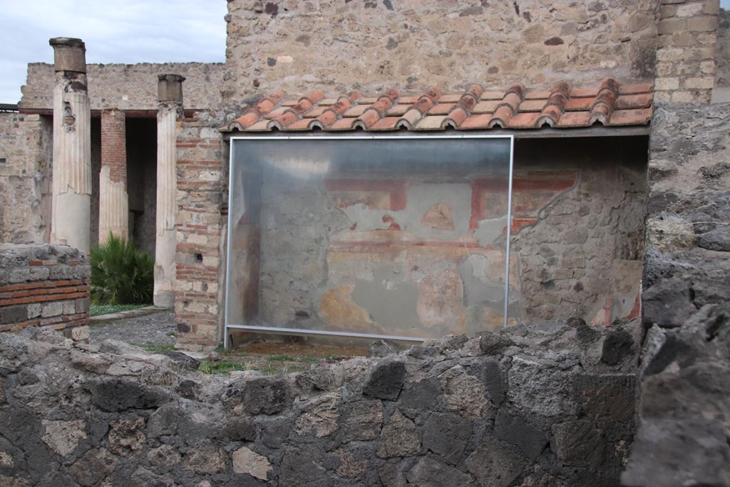 VII.7.5 Pompeii. October 2024. 
Room “m”, looking towards north wall, in centre, and north-west across peristyle, on left. Photo courtesy of Klaus Heese.
