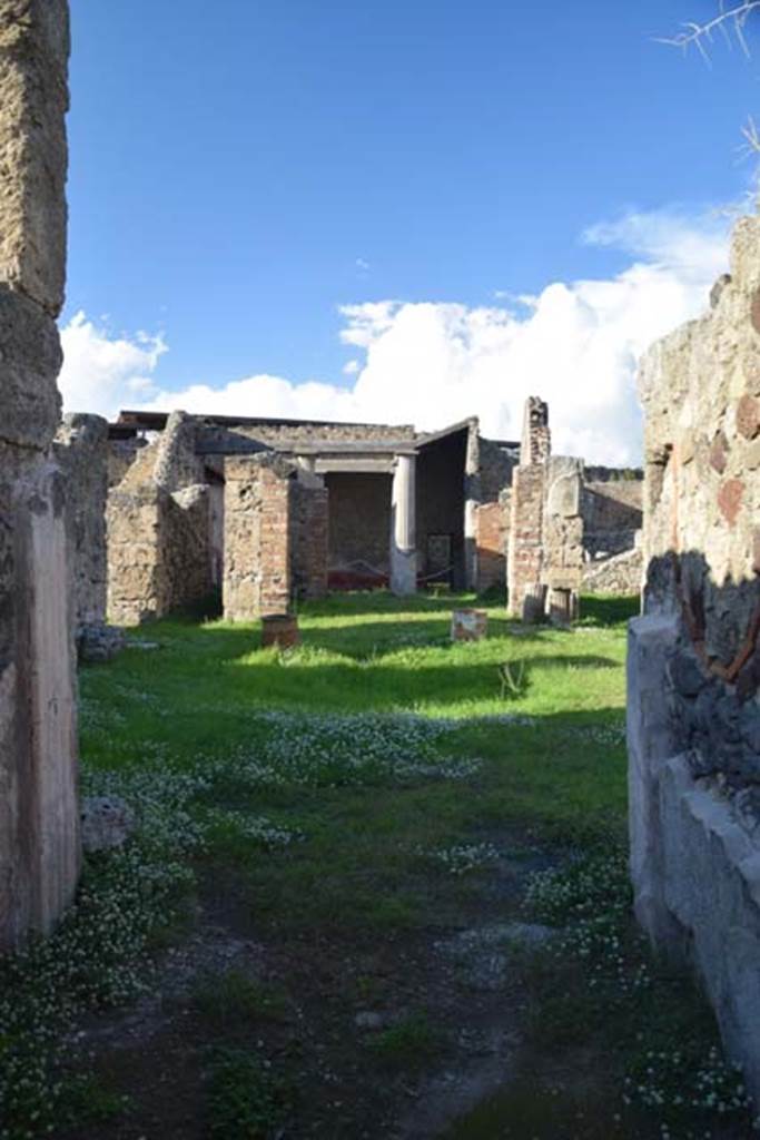 VII.7.10 Pompeii. November 2016. Looking north from entrance doorway.
Photo courtesy of Marie Schulze.
(translation - According to Pagano –
"From the vestibule, or protiro you pass into the atrium with its impluvium in the middle to collect the rainwater, and nearby to the same is the mouth of a small cistern. Four bedrooms, cubicoli, are arranged at the sides, with two alae; and from the one on the left you pass into a small room/cupboard, apotheca, which contained three wooden shelves, of which the outline remains. Between the second cubiculum and the ala on the right, there is a rectangular block of Vesuvian stone, where traces of iron oxide can be seen. This was the place where the money chest of the owner was kept, which was also closed to the wall by an iron plate, which still exists for the most part.
Facing the entrance doorway was the reception room, tablino, and to the right of it, in that room preceded by two steps of white marble, was the painting of the wolf that feeds the twins.
To the left of the same tablinum is a narrow corridor, fauces, which leads into the interior of the house intended for women. In the centre was a garden of flowers, and the prospect of a wall of a grandiose painting of animals, that is a snake wrapped around a tree trunk, an elephant, a bull, a mule, a goat, a lion, a fox, a bear. To the left was seen a garden with fountain flanked by Cariatids, with a large peacock, and topped by statue of a Silenus lying on his wineskin. 
From the door on the left you enter the dining room, followed by the kitchen, equipped with a toilet (now restored with modern wood). (Note this would have been c,1881).
On the right side of the same garden was a recess without a door, where the site of the wooden stairs, which led up to the upper floor would have been. 
Finally, at the rear was the rear door or exit door, protruding into a vicolo/alley.")
See Pagano, N. (1881). Guida di Pompei, ed.9. (p.13-15).

