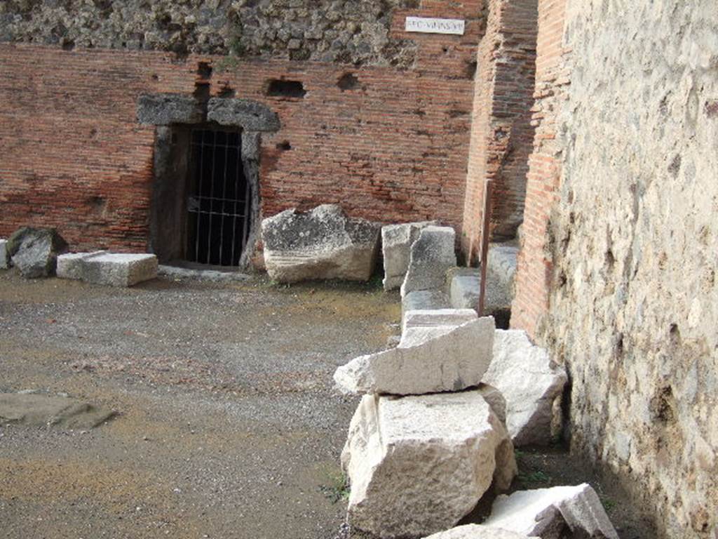VII.7.27 Pompeii. December 2005. Looking west across north side of forum, towards doorway of VII.7.27.

