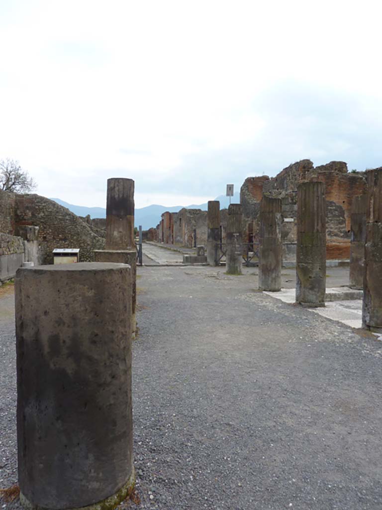VII.8, Pompeii Forum. March 2014. 
Looking south along east portico in south-east corner of Forum, towards Via delle Scuole.  
Foto Annette Haug, ERC Grant 681269 DÉCOR.
