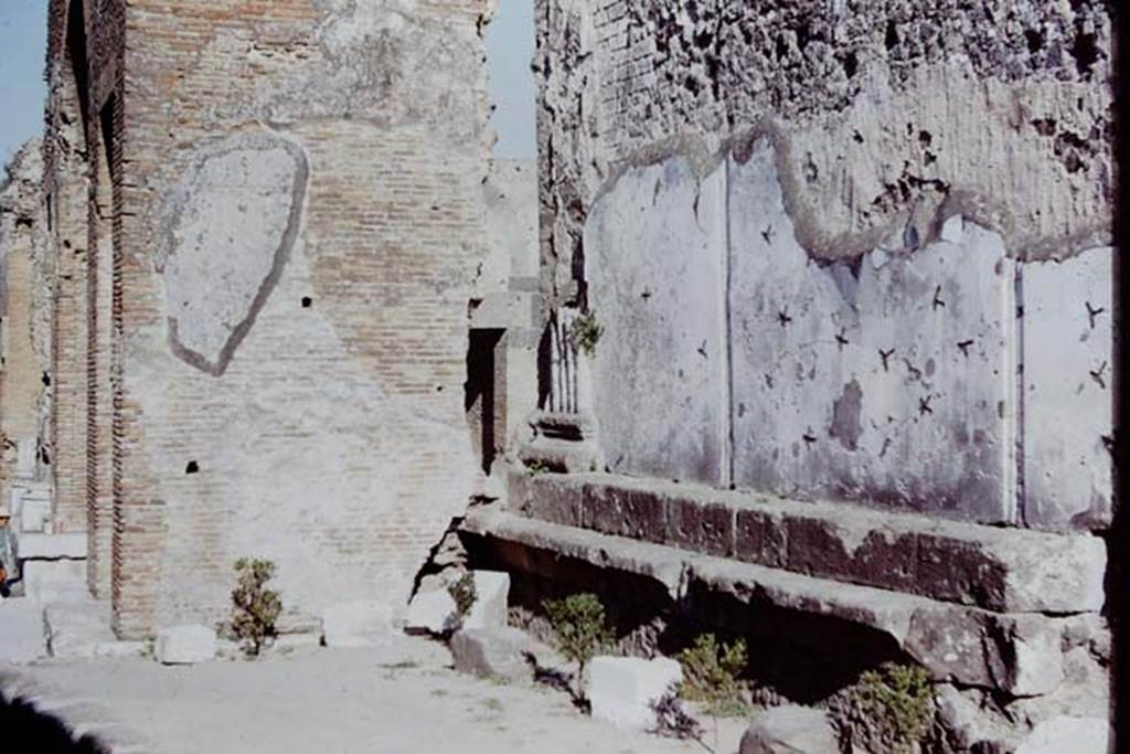 VII.8 Pompeii Forum. 1968. Looking east along bench? on outside north wall of Forum. 
Photo by Stanley A. Jashemski.
Source: The Wilhelmina and Stanley A. Jashemski archive in the University of Maryland Library, Special Collections (See collection page) and made available under the Creative Commons Attribution-Non Commercial License v.4. See Licence and use details.
J68f2330
