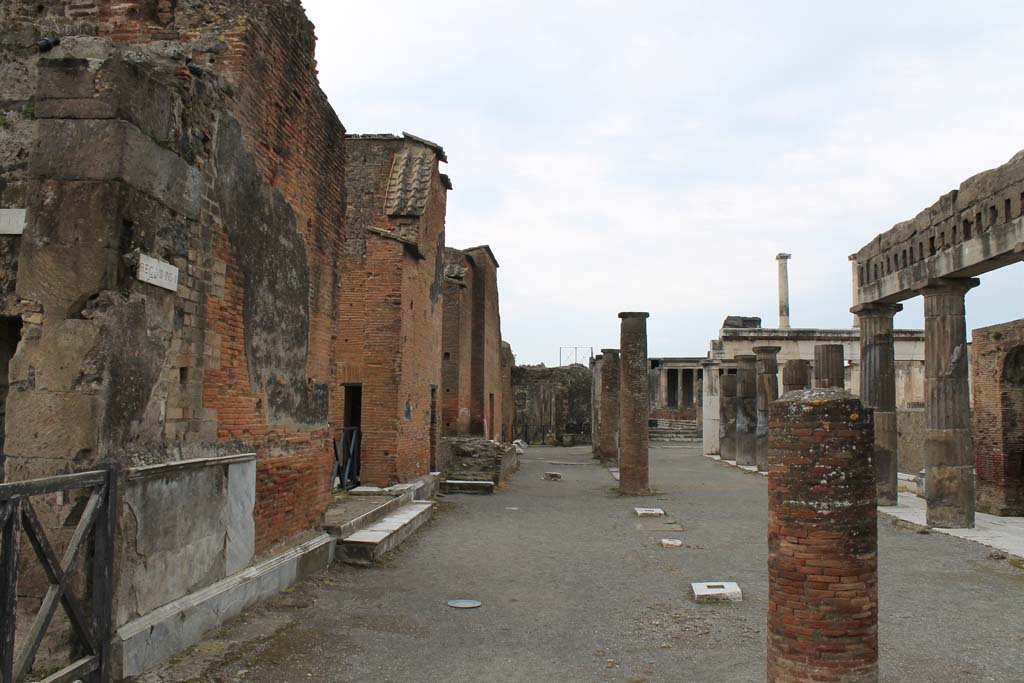 VII.8 Pompeii. March 2014. Looking west along south side of forum from near steps at VIII.2.10, centre left.  
Foto Annette Haug, ERC Grant 681269 DÉCOR.
