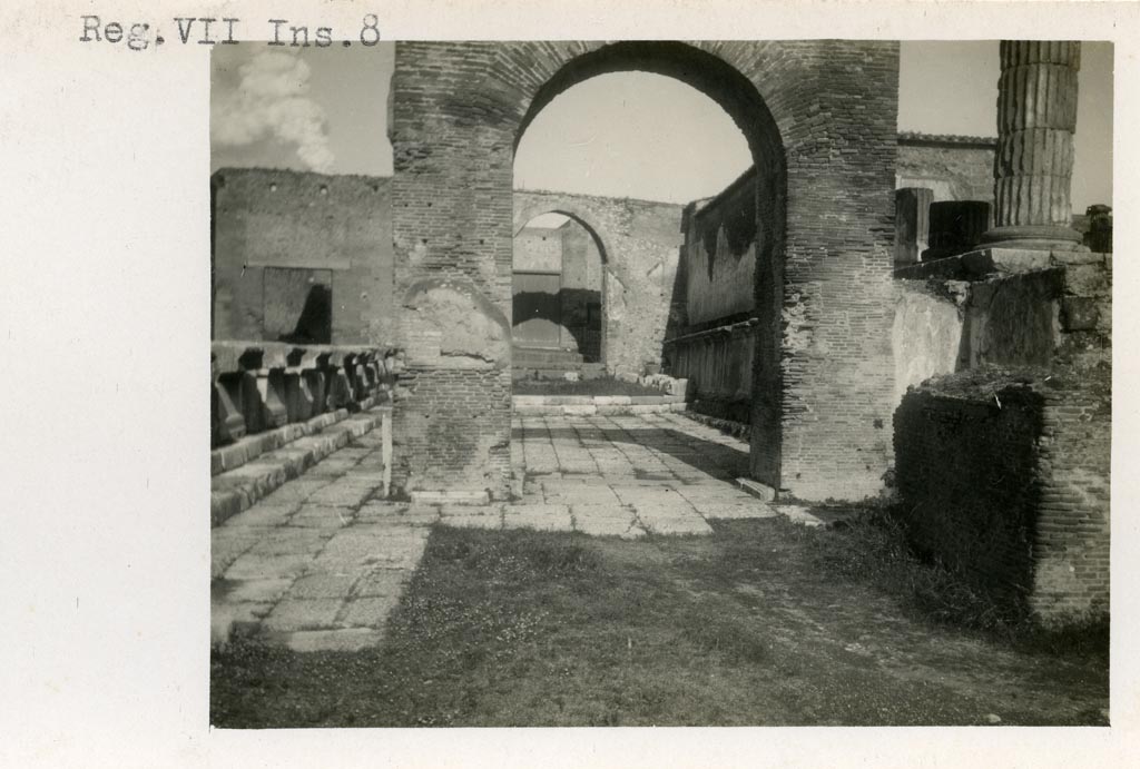 VII.8.1 Pompeii. Pre-1937-39. Looking north through Arch of Augustus and towards west side of Temple of Jupiter. 
Photo courtesy of American Academy in Rome, Photographic Archive. Warsher collection no. 1112.
