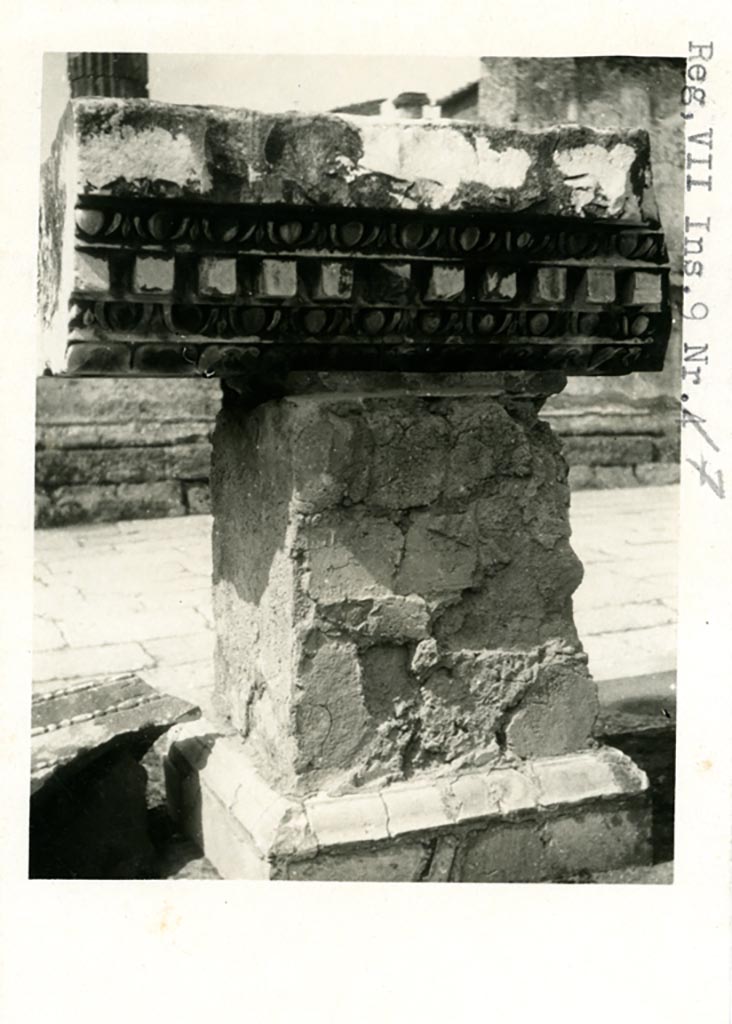 VII.9.7/8 Pompeii. Pre-1937-39. 
Detail of stone from top of portico resting on statue base, looking west.
Photo courtesy of American Academy in Rome, Photographic Archive. Warsher collection no. 194.
