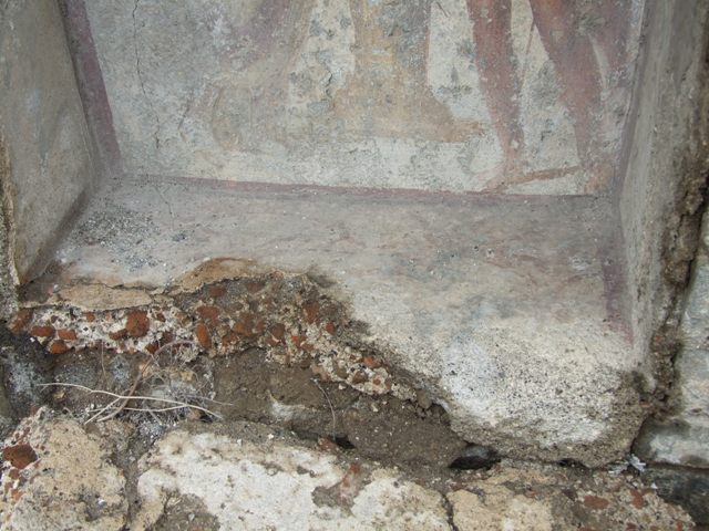 VII.11.14 Pompeii. March 2009. Garden “C”, Lararium, base of niche and remains of altar.