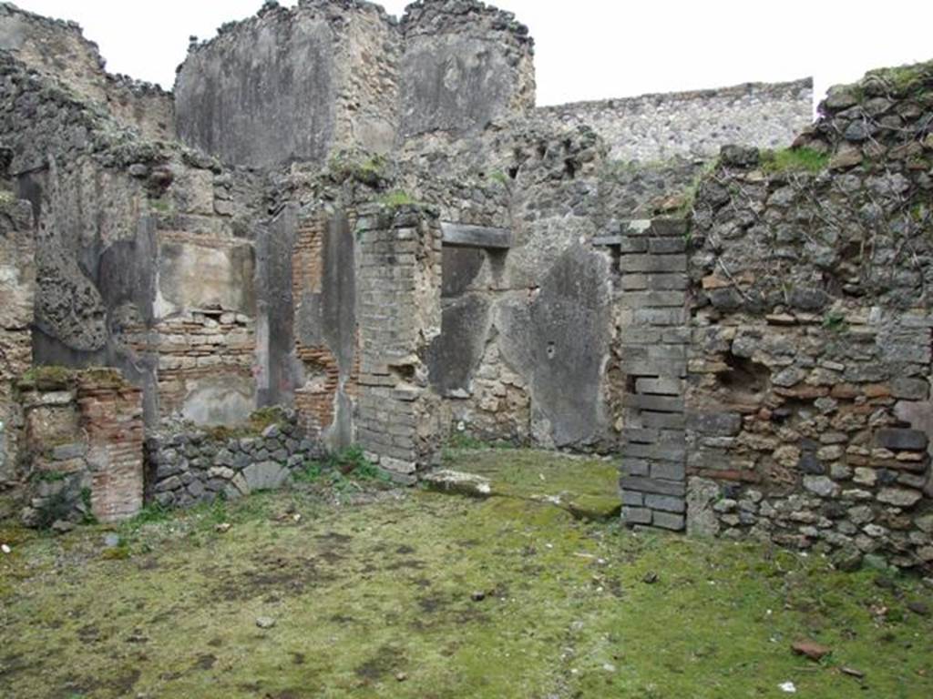 VII.11.14 Pompeii.  March 2009. North east corner of Garden area “A”, with step to entrance passageway, Room 1.