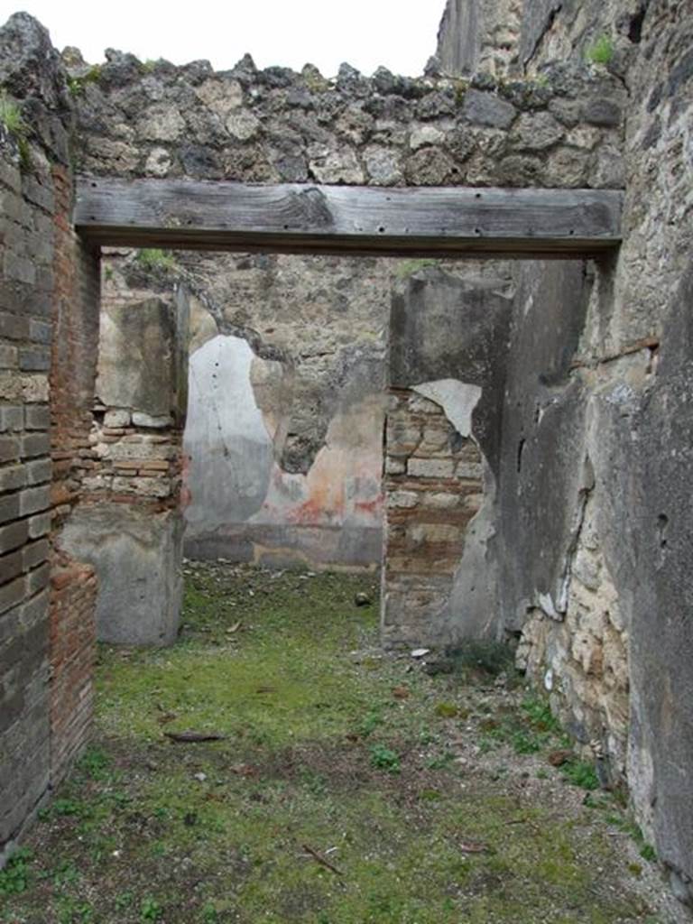 VII.11.14 Pompeii. March 2009. North end of room 1, the passageway, with doorway to room 3, triclinium.
