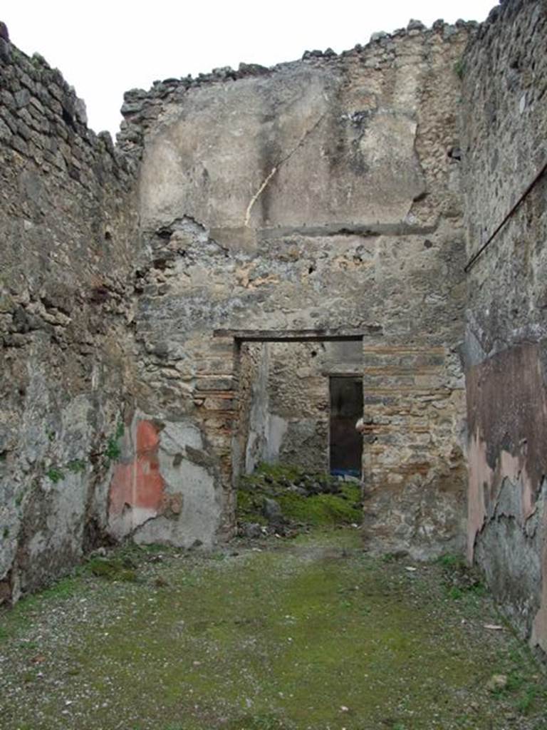 VII.11.14 Pompeii. March 2009. Room 7, north wall of tablinum, with doorway to the atrium, room 8.