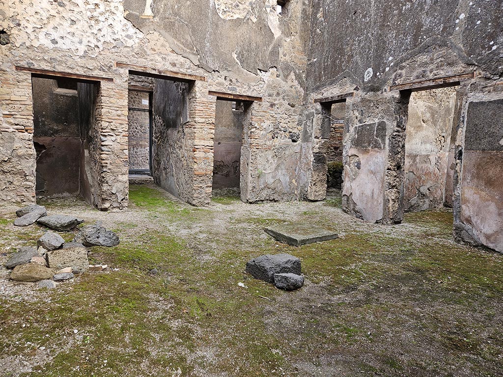 VII.11.11/14 Pompeii. November 2024. Looking north-east across room 8, atrium area of VII.11.11. Photo courtesy of Annette Haug.