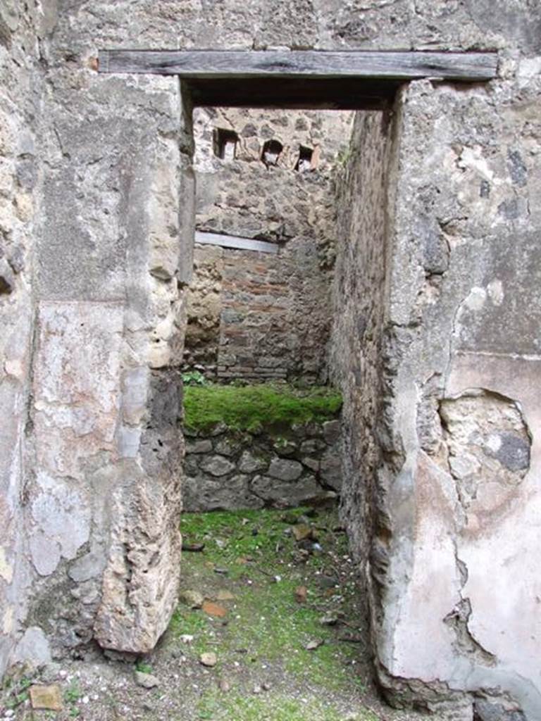 VII.11.14 Pompeii.  March 2009.  Room 11. Entrance to kitchen.