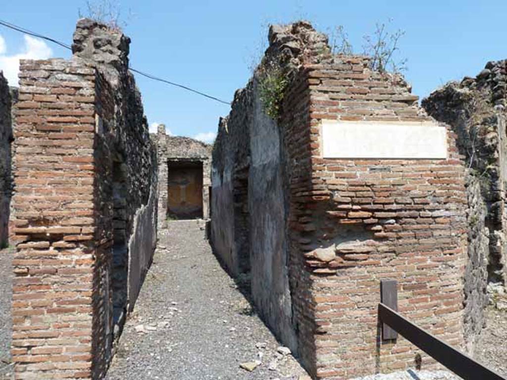 VII.12.26 Pompeii. May 2010. Entrance corridor, looking north to area of small garden.