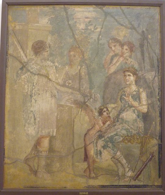VII.12.26 Pompeii. Found in room on left hand side behind atrium.
Wall painting of Artemis, seated, turning towards the nymph Callisto.
Now in Naples Archaeological Museum. Inventory number 111441.
See Helbig, W., 1868. Wandgemälde der vom Vesuv verschütteten Städte Campaniens. Leipzig: Breitkopf und Härtel. (253).
According to Richardson, he thought this may have been a painting of Aeneas and Dido?  He wrote that a wall painting of Theseus abandoning Ariadne was also found in this room. Also found was a Tondo (medallions) with head of a Satyr, and Tondi with busts. See Richardson, L., 2000. A Catalog of Identifiable Figure Painters of Ancient Pompeii, Herculaneum. Baltimore: John Hopkins. (p.146) 
