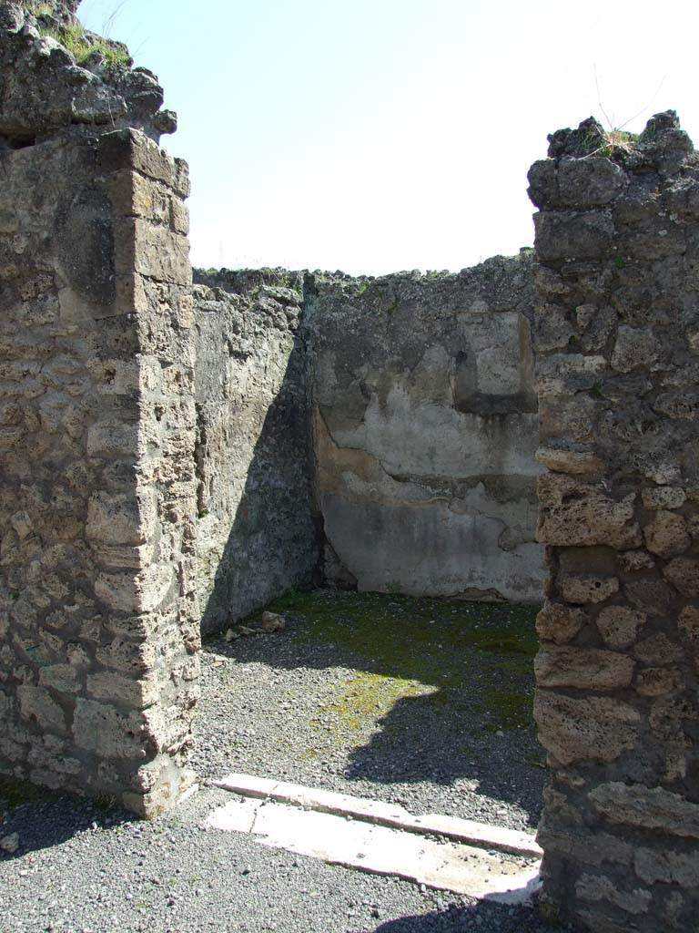 VII.14.9 Pompeii. March 2009. Doorway to room 12, from south portico.
