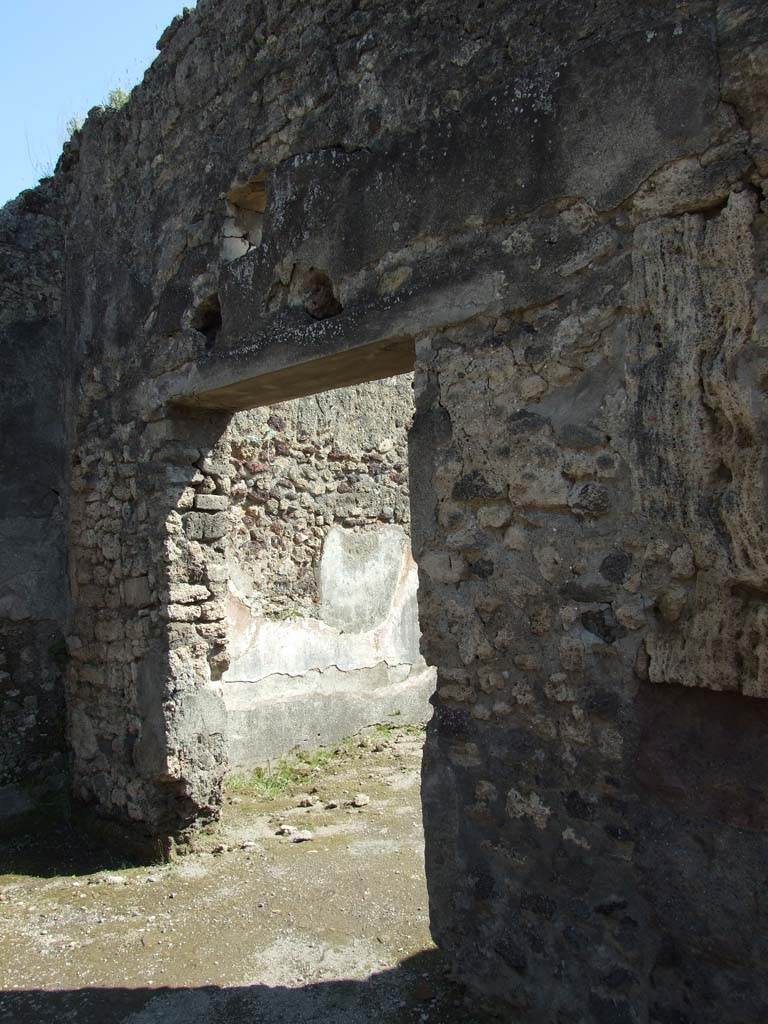 VII.14.9 Pompeii. March 2009. Doorway to room 13, in south portico.