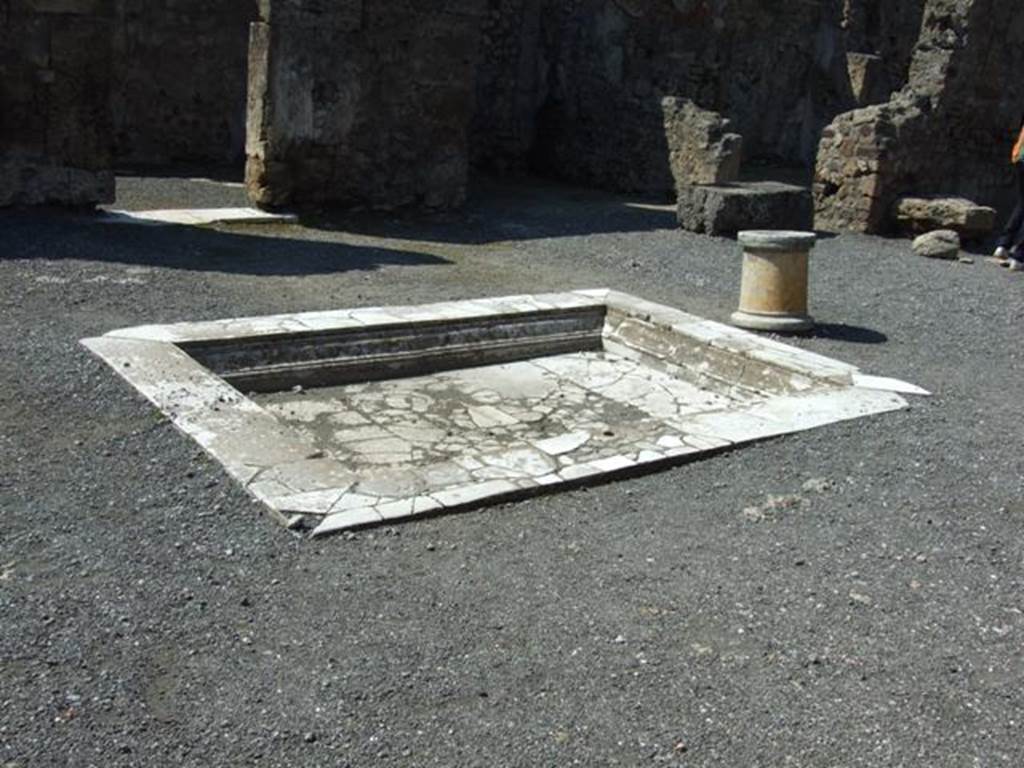 VII.14.9 Pompeii. March 2009. Room 1, looking north-west across impluvium in atrium.  
